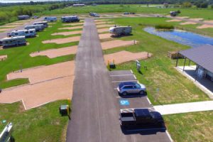 A view of the spacious RV parking lots at Hardy's Landing RV Parks College Station and RV Park Bryan Texas.