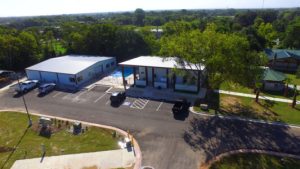 Aerial view of the pool building at Hardy's Resort RV Park in College Station, Texas.