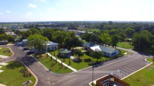 Aerial view of the main building at Hardy's Resort RV Park in College Station, Texas.